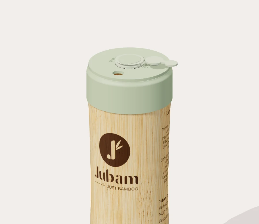 Pop the stopper out of the opening, then turn it to the side. Tilt the bottle and press to dose.